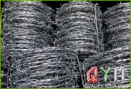 Galvanized barb wire fence